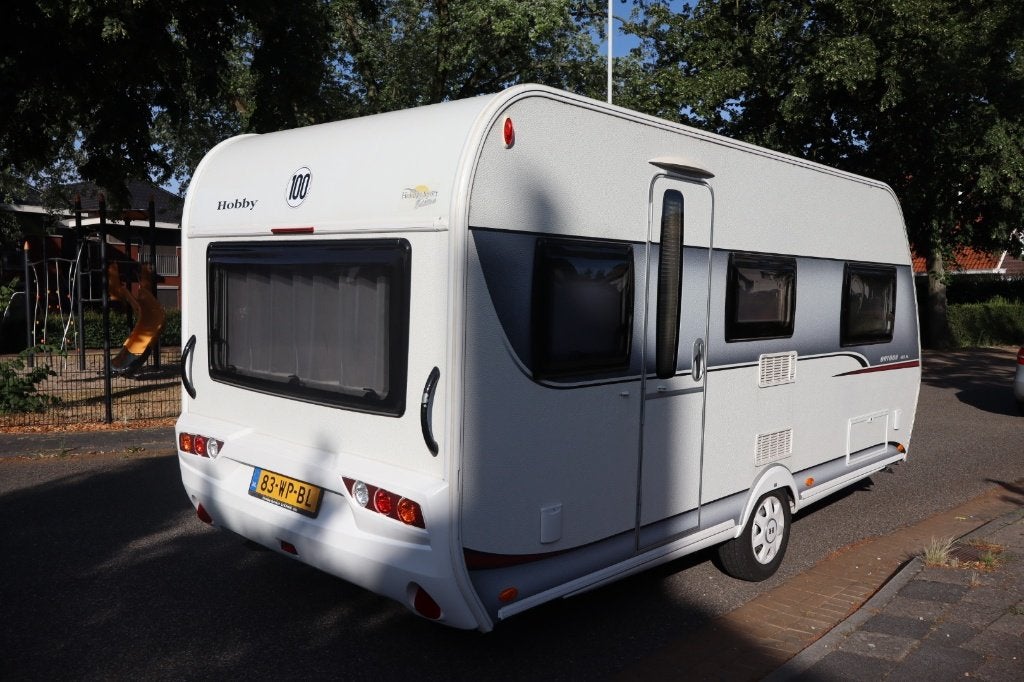 Te koop Hobby On Tour 460 HL, Caravans en Kamperen, Caravans, 2 aparte bedden, Hobby, Kachel, Treinzit