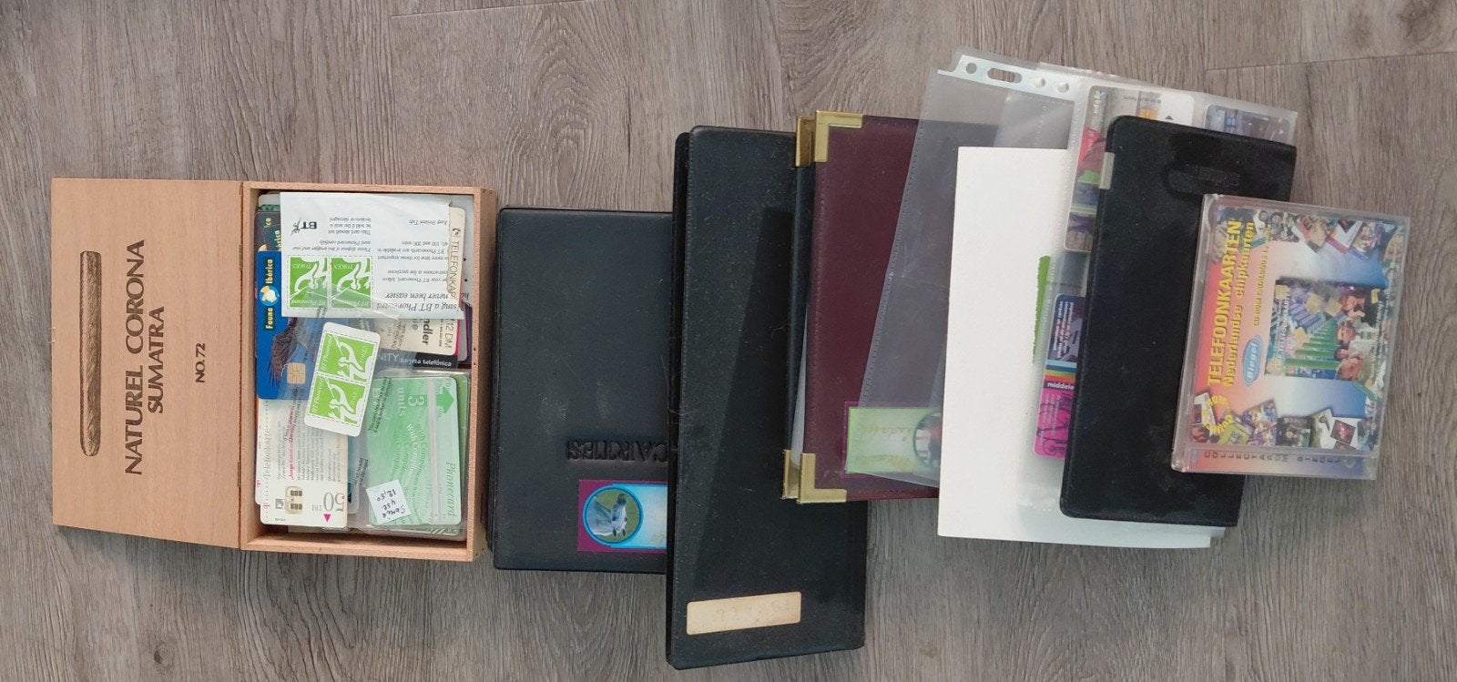 Grote collectie telefoonkaarten en mappen, Ophalen