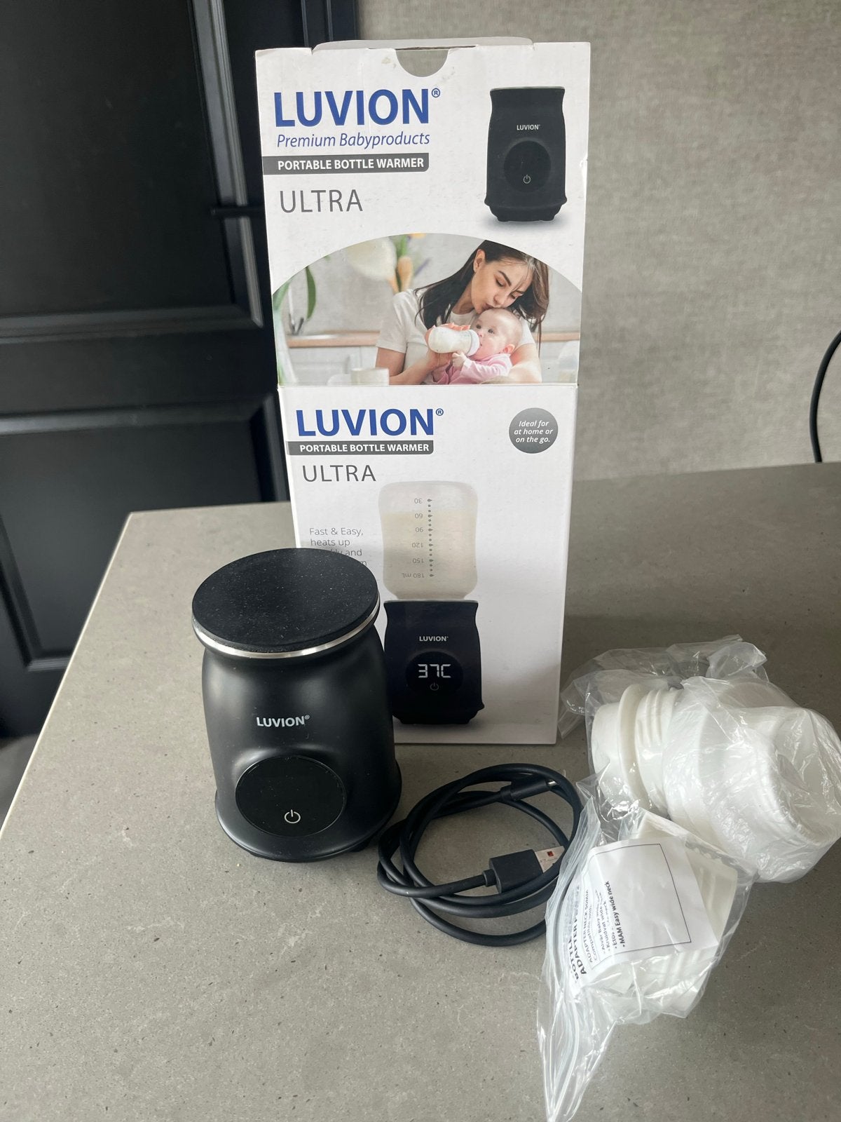 Luvion Ultra Draagbare Flessenwarmer - Inclusief Difrax ring, Ophalen, Flessen- of potjesverwarmer, Luvion, Zo goed als nieuw