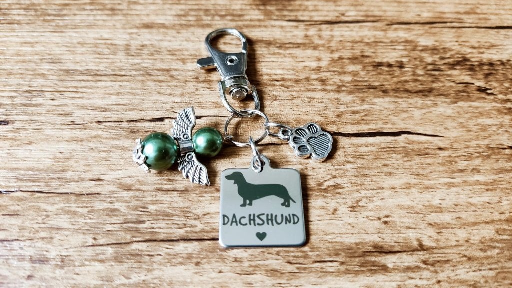 Tashanger Sleutelhanger Teckel RVS met beschermengeltje, Verzenden, Nieuw, Overige kleuren, Schoudertasje