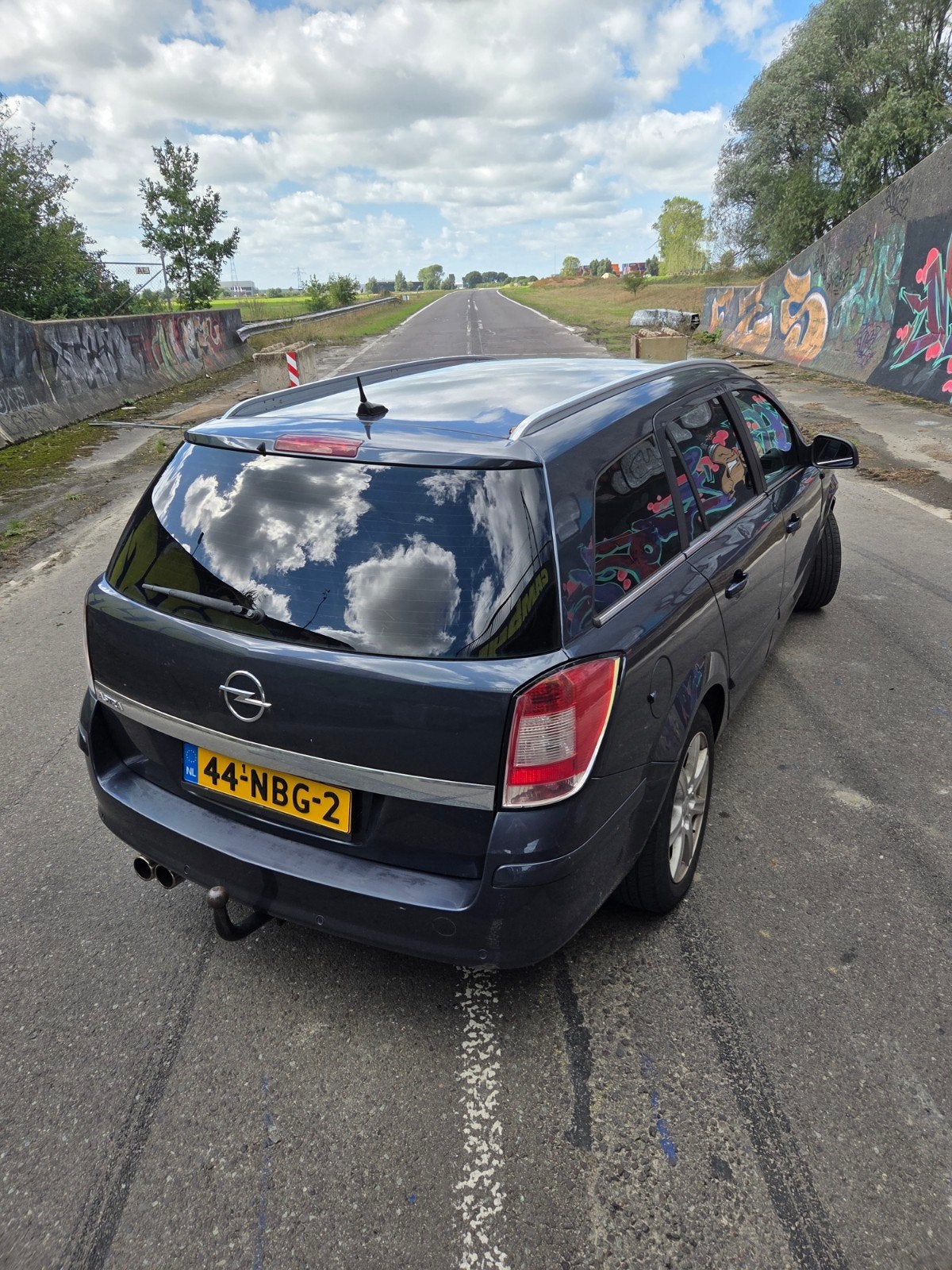 Opel Astra Wagon 1.6 Cosmo |*NEW APK*|SPORTIEF|HANDEL/EXPORT, Voorwielaandrijving, 15 km/l, Zwart, Blauw