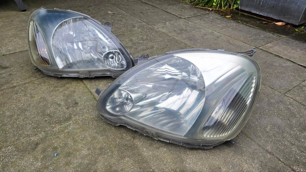 Toyota Yaris druppelkoplampen 2003-2005, Ophalen of Verzenden, Gebruikt, Toyota
