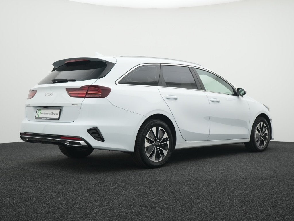 Kia Ceed Sportswagon 1.6 GDi PHEV DynamicLine | Camera | Car, Auto's, 12 maanden, Stof, Gebruikt, Wit