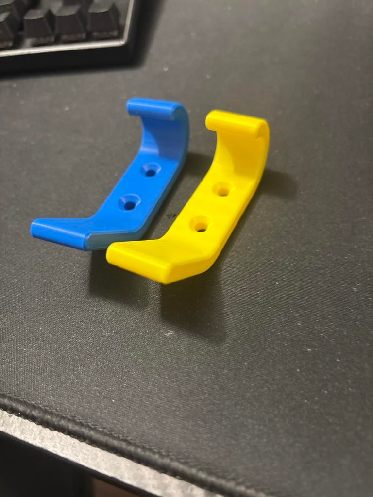 Blauwe en gele wandhaken, Kunststof, Gebruikt, Wandhaken, Ophalen of Verzenden