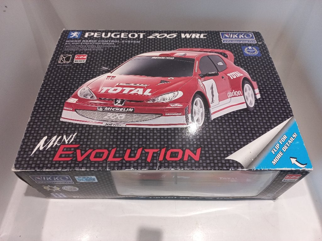 Peugeot 206 WRC Nikko Mini Evolution Radio Control System, Ophalen of Verzenden, Zo goed als nieuw, Overige schalen, Auto onroad