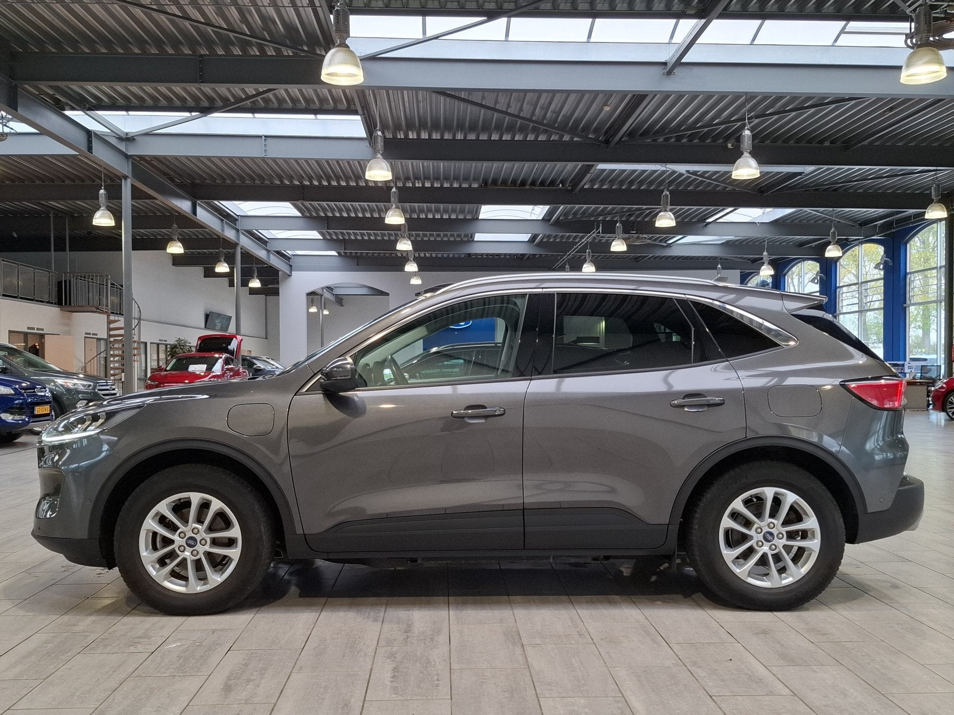 Ford Kuga 2.5 PHEV Titanium X | Trekhaak | Winter pack | SOH, 14 kWh, Gebruikt, 4 cilinders, Leder en Stof