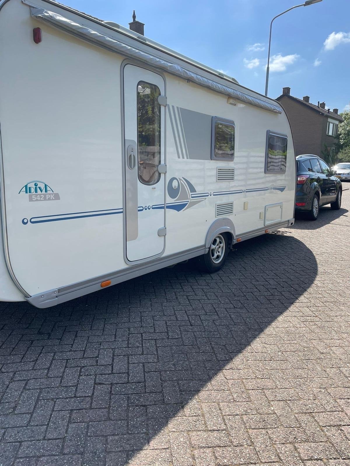 Adria Adiva 542PK stapelbed, airco, mover, voortent & luifel, Caravans en Kamperen, Stapelbed, Schokbreker, Treinzit, Particulier