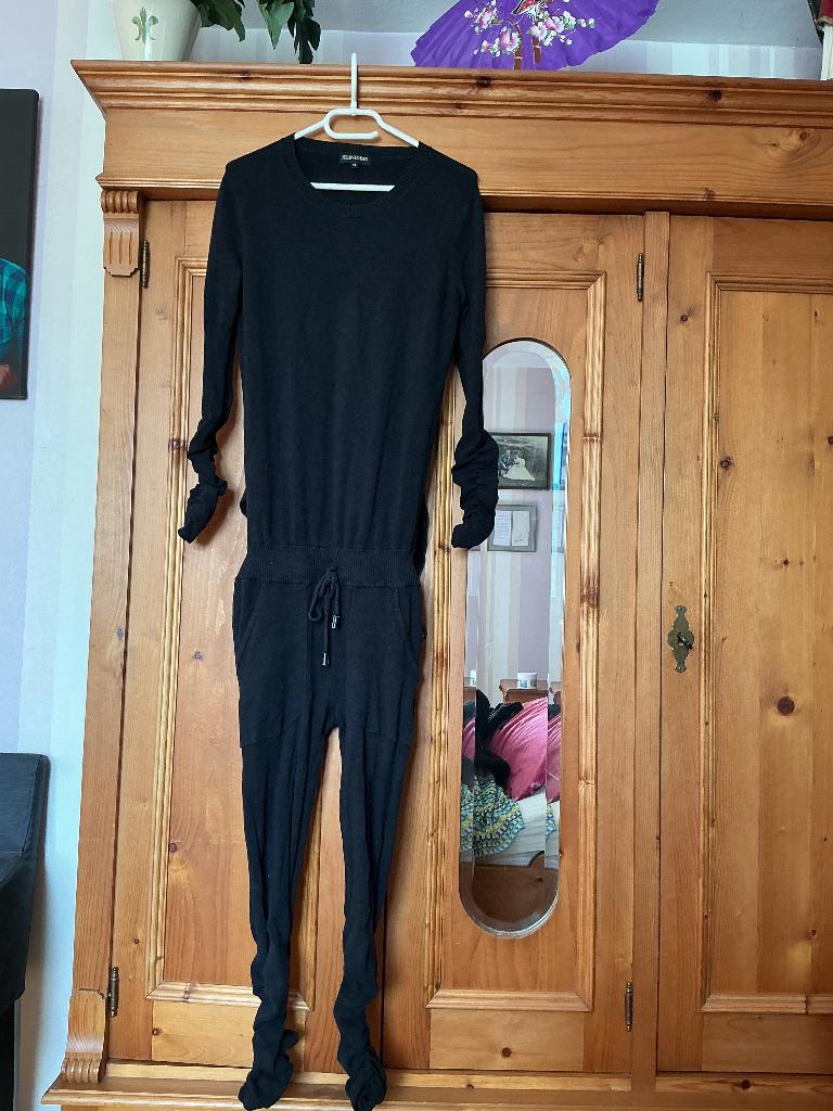 Zwarte jumpsuit van reinders met open achterkant. Maat xs, Reinders, Zwart, Ophalen of Verzenden, Maat 34 (XS) of kleiner
