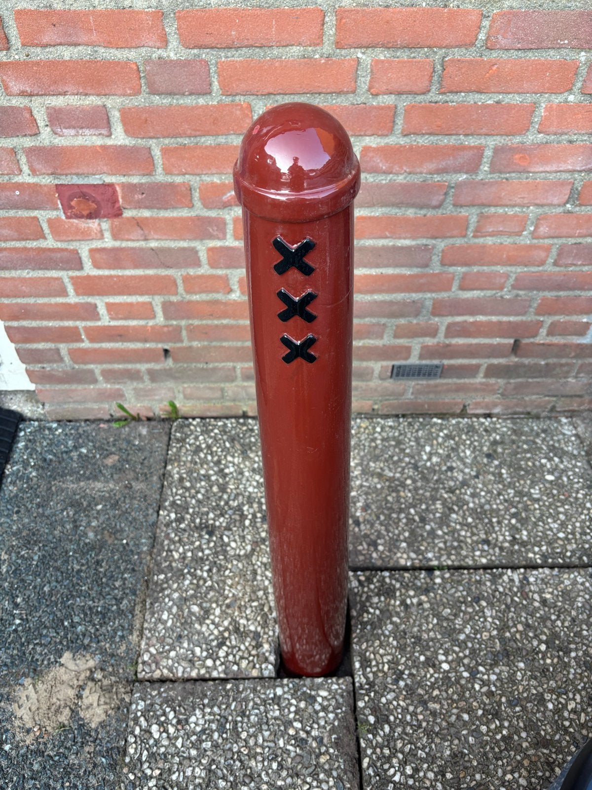 Amsterdamse paal met XXX-logo, Ophalen