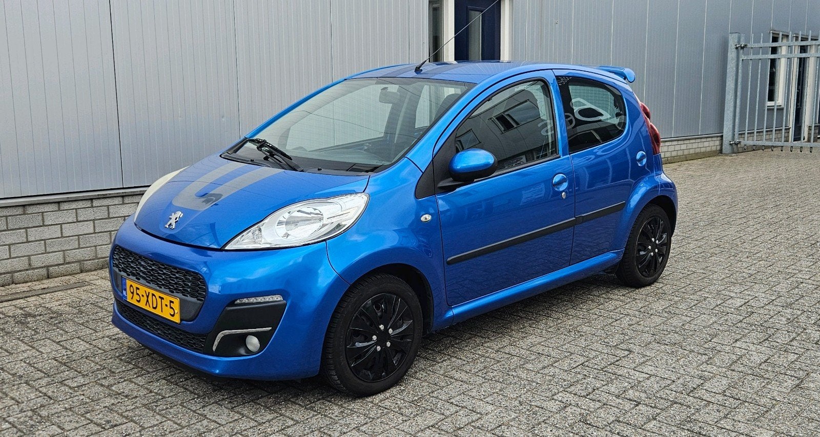 Peugeot 107 1.0 12V 5DR 2012 Blauw - Airco - Bluetooth, Voorwielaandrijving, Stof, Origineel Nederlands, Handgeschakeld