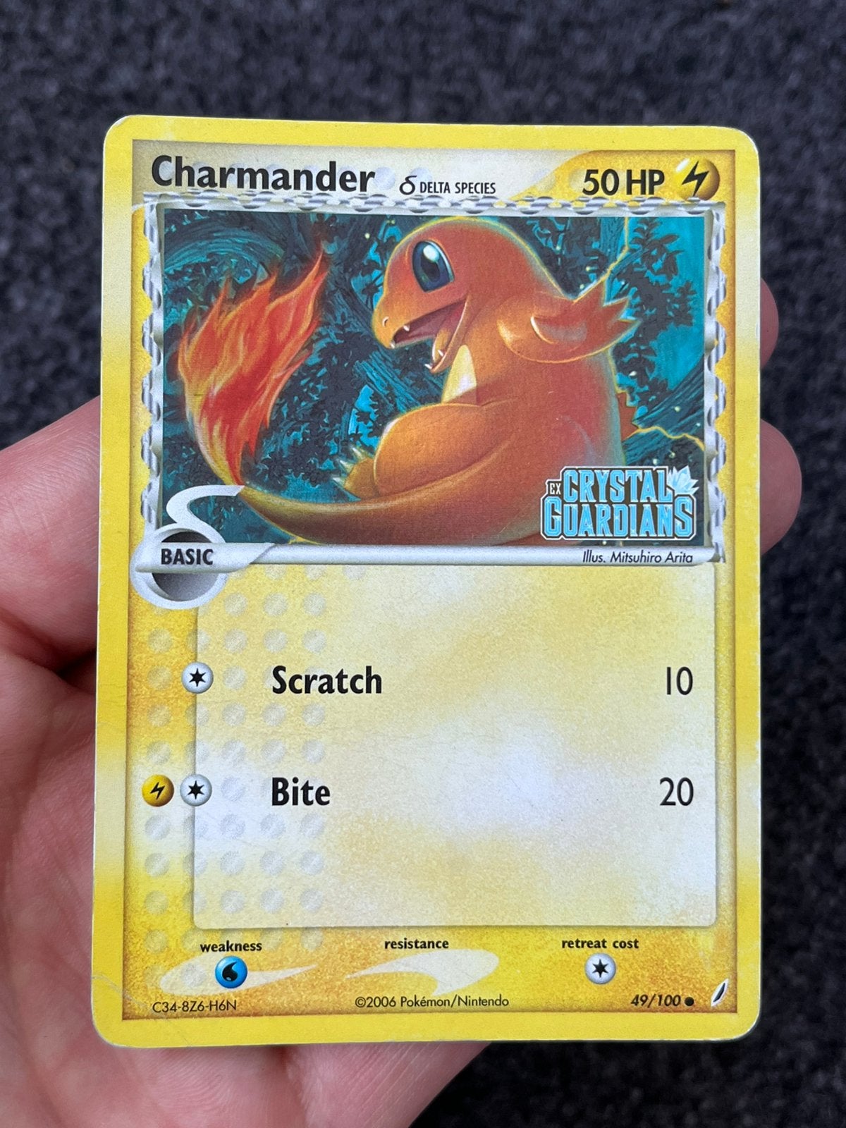 Pokémon Charmander reverse holo #49 ex crystal guardians -LP, Ophalen of Verzenden, Zo goed als nieuw, Losse kaart, Foil