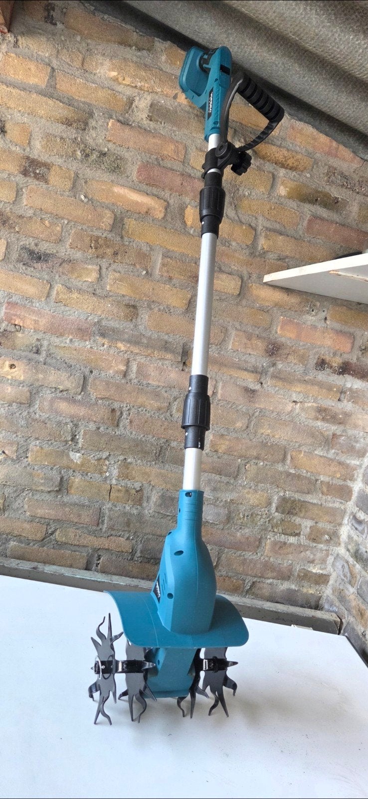 comete tuinset-accu tuinfrees+elektrische voegenborstel, Ophalen