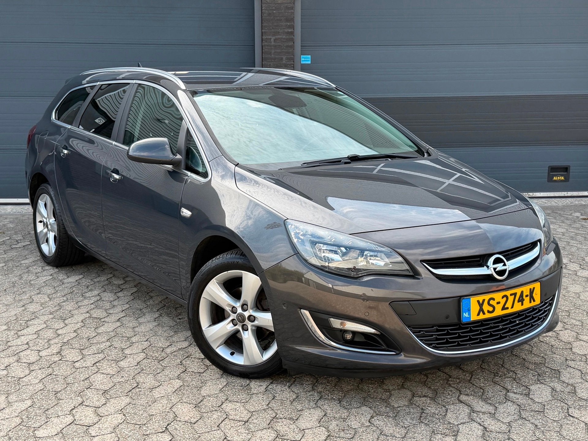 Opel Astra Sports Tourer 1.4 Turbo Sport|NAVI|CAMERA|LEER|CL, Voorwielaandrijving, Euro 5, 15 km/l, Gebruikt