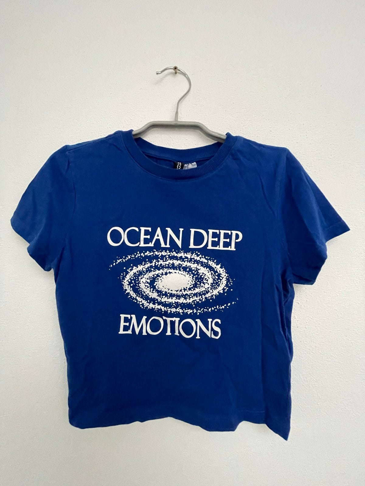 Blauw T-shirt met 'Ocean Deep Emotions' print - Maat 36, Blauw, Ophalen of Verzenden, Zo goed als nieuw, Korte mouw