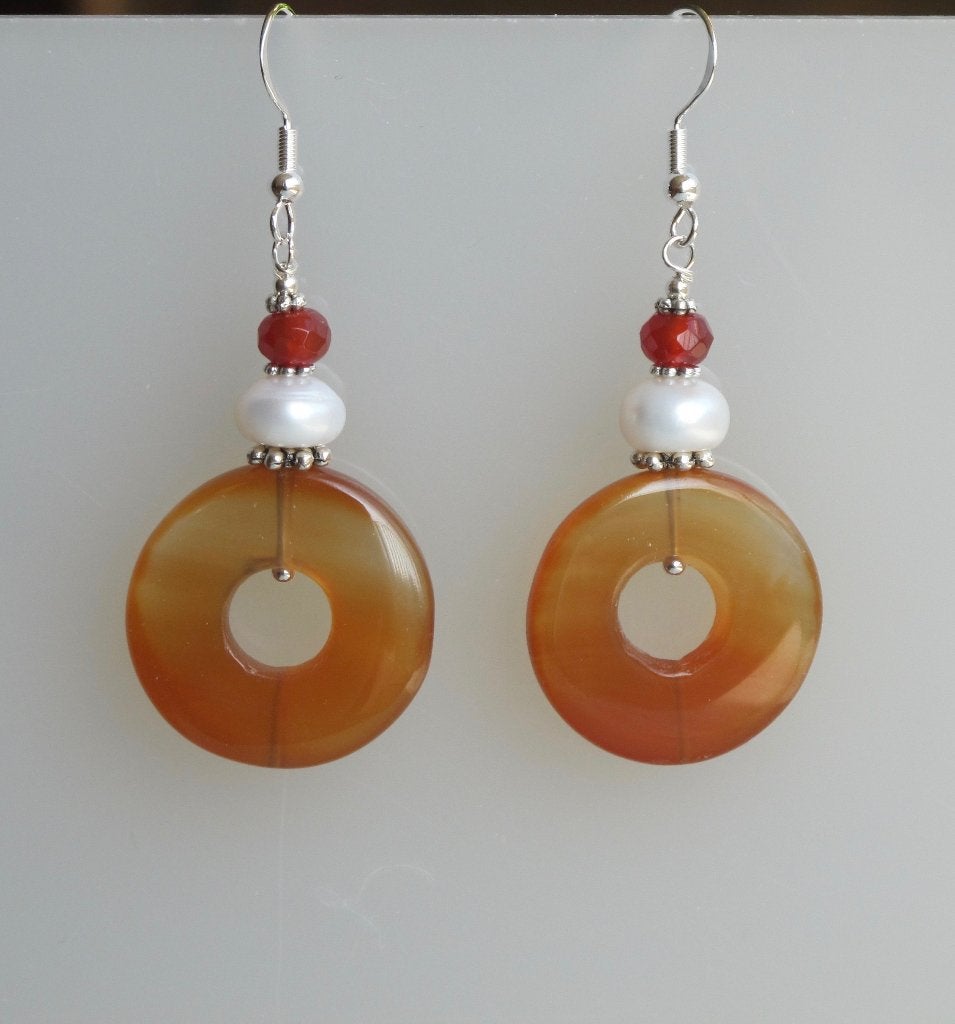 AANBIEDING: Prachtige oorbellen met Carneool donut en parel, Hangers, Verzenden, Nieuw, Oranje