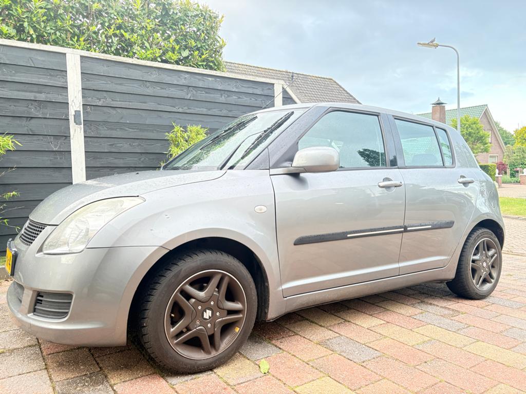 Suzuki Swift 1.3 5D 2010 Grijs, Auto's, Suzuki, Particulier, Swift, Benzine, C, Hatchback, Handgeschakeld, Origineel Nederlands