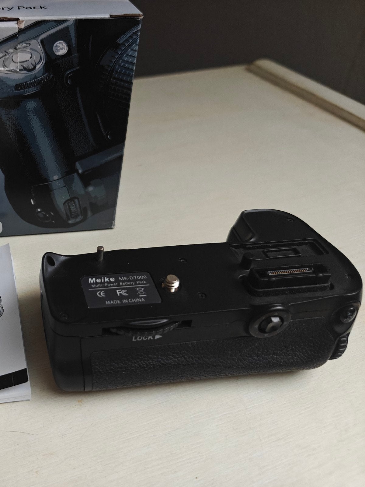 Battery grip voor Nikon D7000, Ophalen
