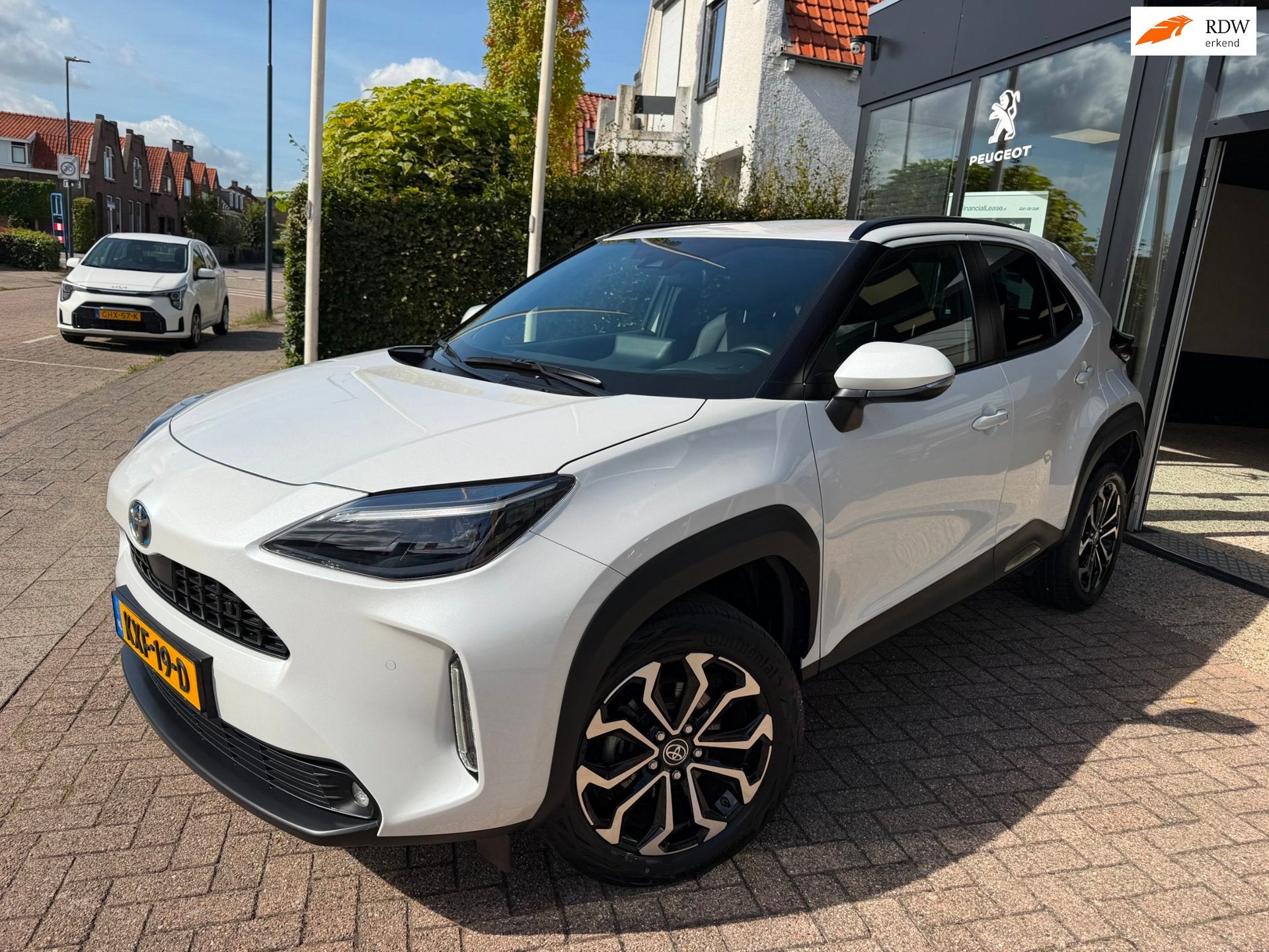 Toyota Yaris Cross 1.5 Hybrid Dynamic|Half Leder|PDC, Dealer onderhouden, Gebruikt, Met garantie (alle), Leder en Stof