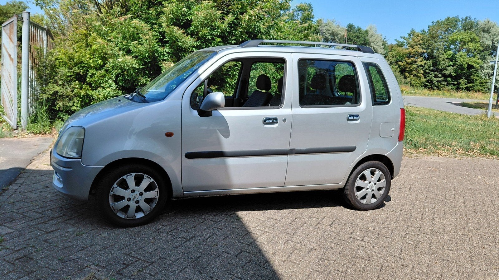 Opel Agila 1.2 I 16V 2002 Grijs, Auto's, Voorwielaandrijving, 15 km/l, 74 pk, 31 €/maand
