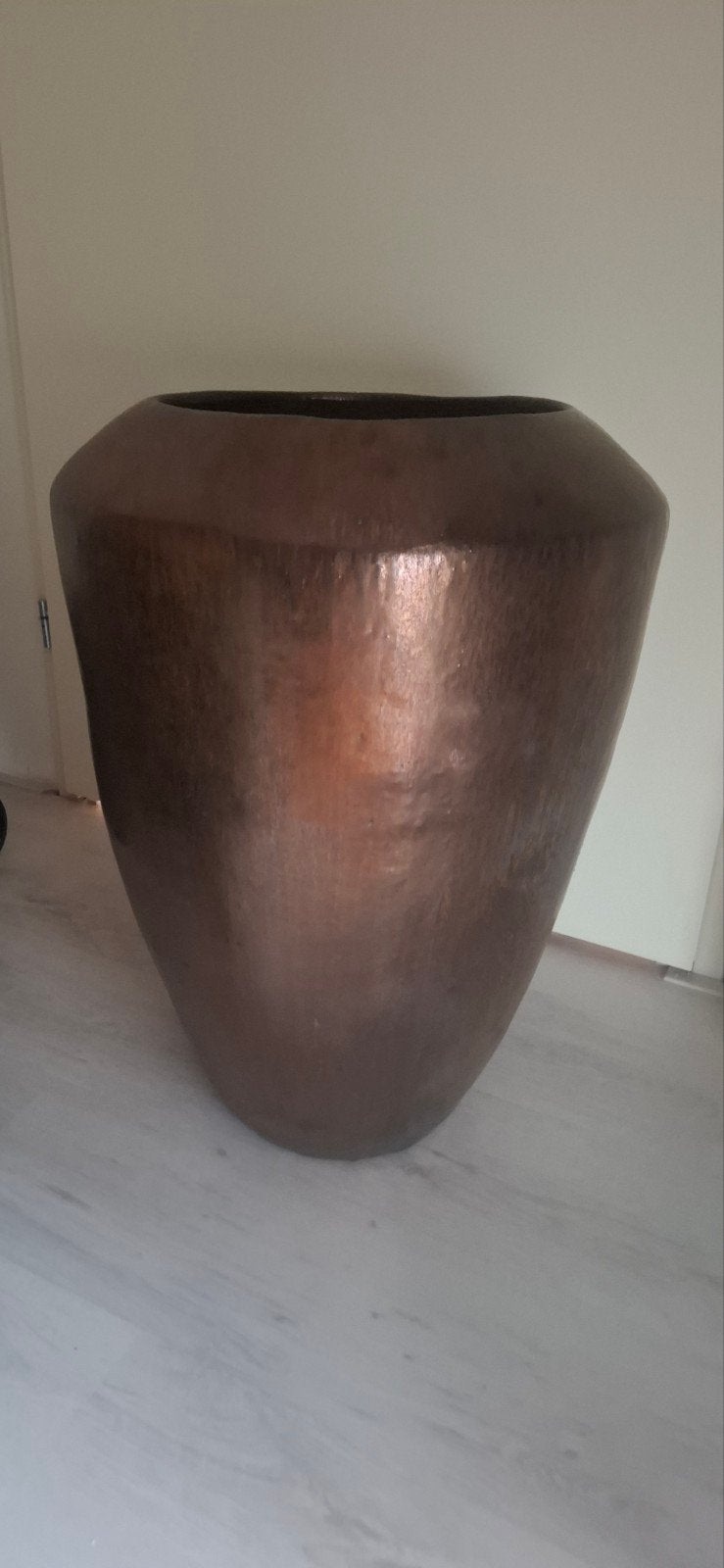 Decoratieve stenen vloervaas, Ophalen