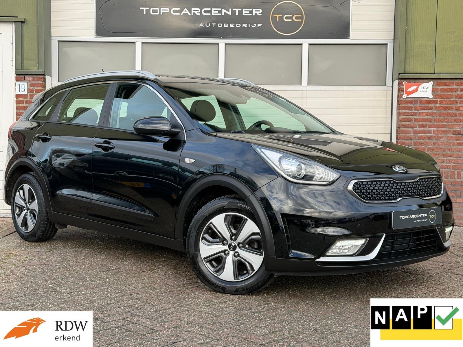 Kia Niro 1.6 GDi Hybrid ComfortLine/AIRCO/AUT/TREKH/APK/NAP, Auto's, Euro 6, Zwart, Origineel Nederlands, 26 km/l