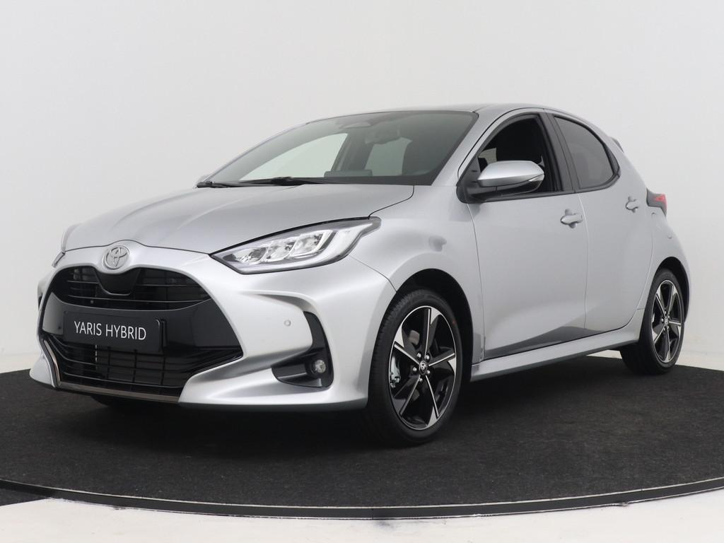 Toyota Yaris 1.5 Hybrid 115 Dynamic | NIEUW & DIRECT LEVERBA, Auto's, Toyota, 12 maanden, Stof, Zwart, Automatische klimaatregeling