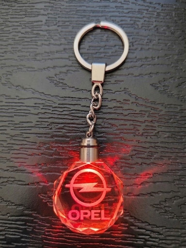 Opel glazen met roterend ledlicht sleutelhanger, Auto-onderdelen, Ophalen of Verzenden, Nieuw, Opel
