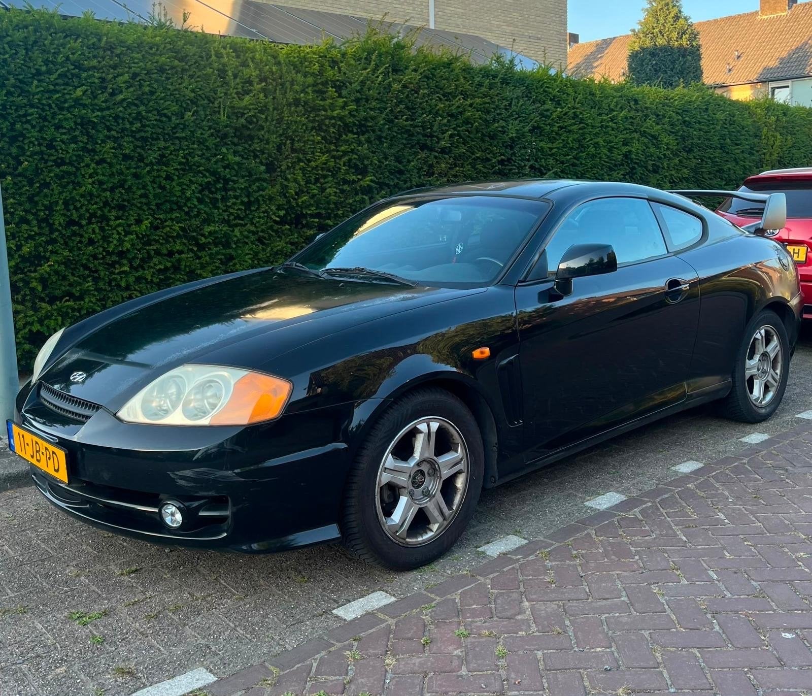 Hyundai Coupé 2.0 2002 Zwart OPKNAPPER, Auto's, Hyundai, Particulier, Coupé, Bluetooth, Centrale vergrendeling, Cruise Control