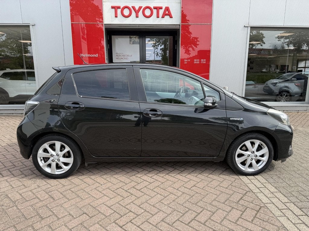 Toyota Yaris 1.5 Full Hybrid Dynamic Panoramadak, Auto's, Toyota, Gebruikt, 4 cilinders, Origineel Nederlands, Bedrijf