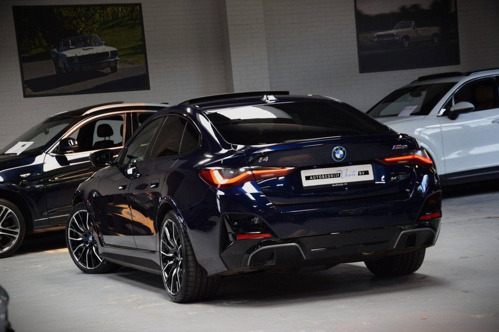 BMW I4 M50 High Executive 84 kWh Navi|Schuif/kantel-dak|ACC|, Auto's, BMW, Gebruikt, 520 km, 110 €/maand, Blauw
