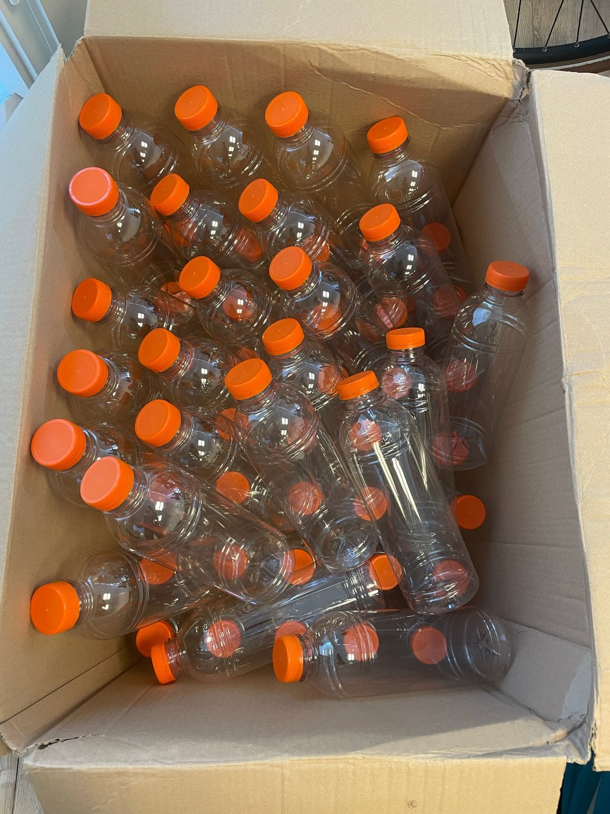 Lege plastic flessen met oranje dop van 1liter, Ophalen, Gebruikt, Meerkleurig, Kunststof