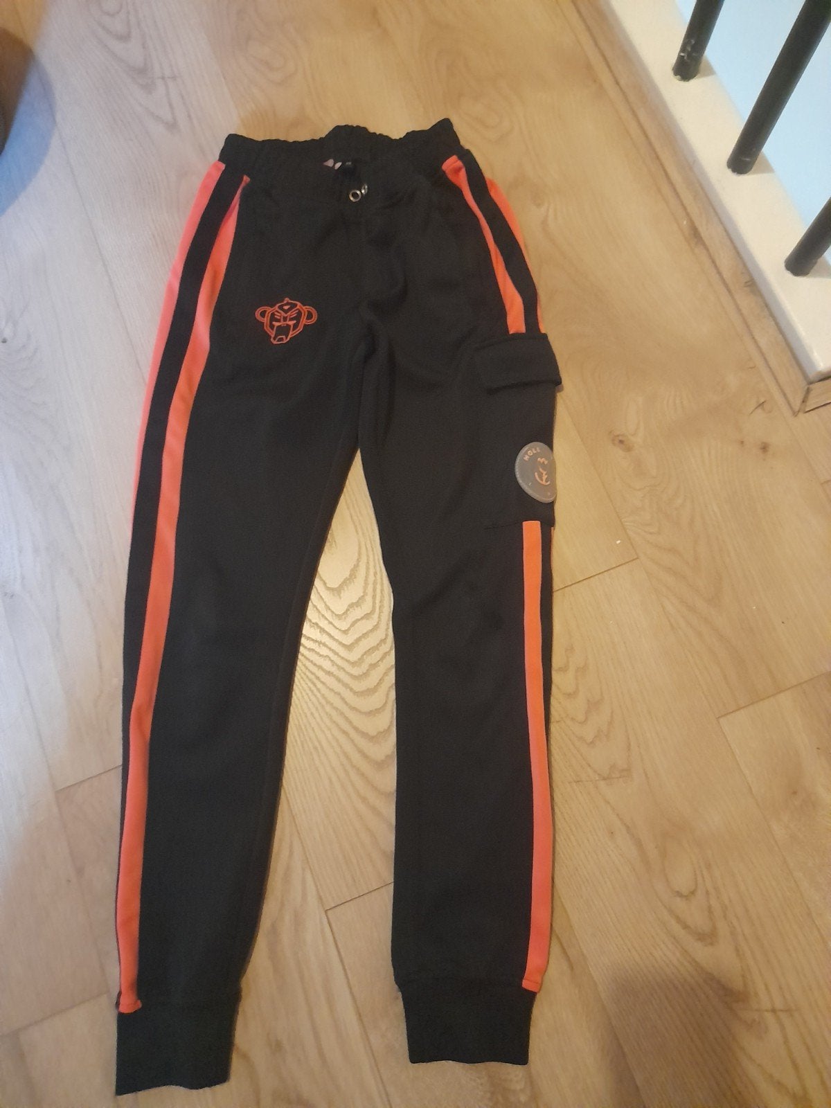 Zwarte joggingbroek met oranje strepen - Maat XS, Zwart, Black bananas, Ophalen of Verzenden, Maat 34 (XS) of kleiner