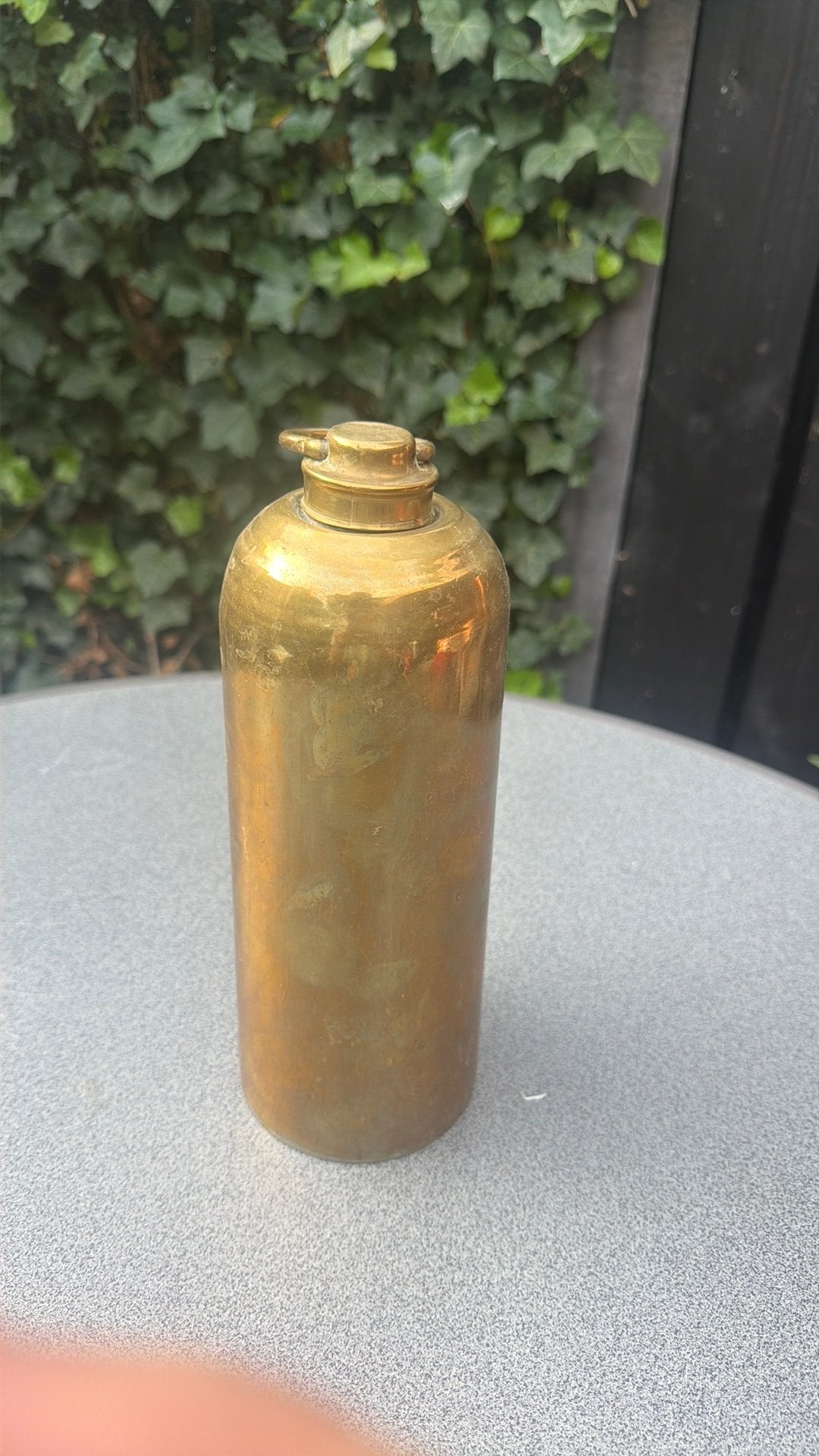 Antieke messing kruik, Ophalen