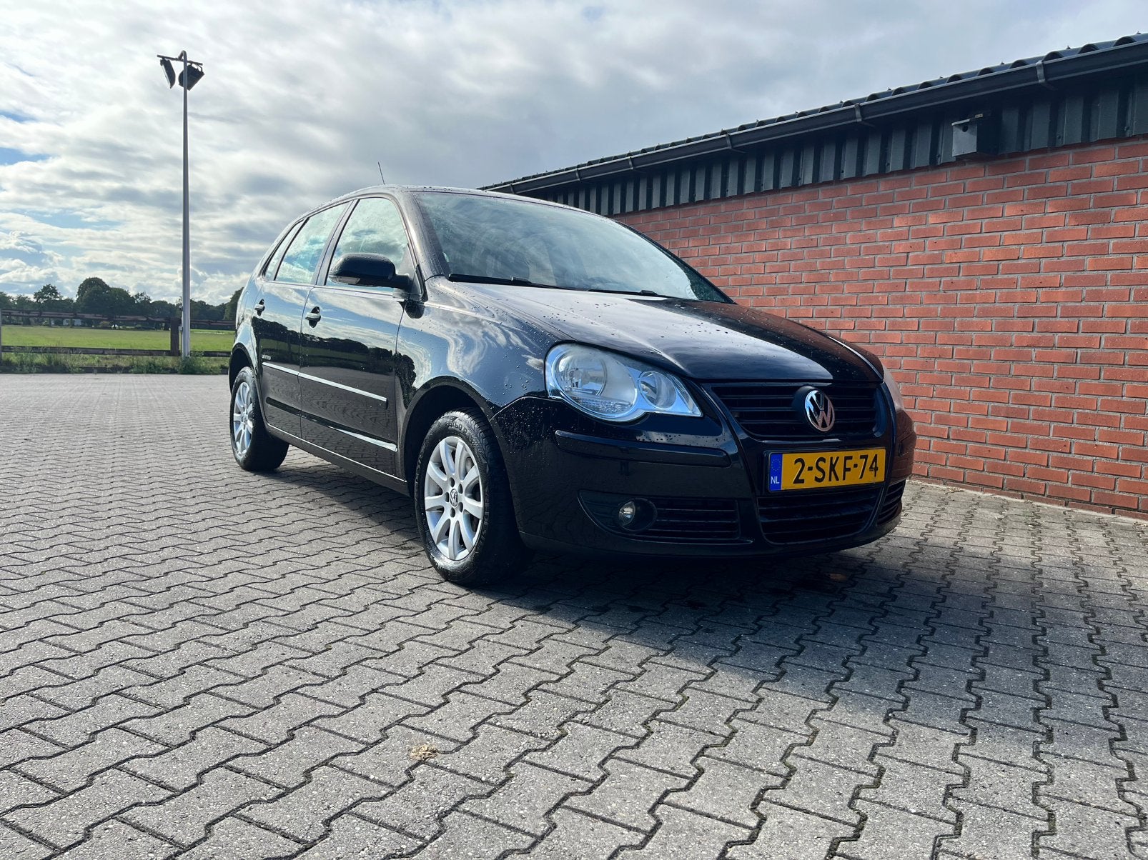 Volkswagen Polo 1.4 16V 59KW 2009 Zwart, Voorwielaandrijving, Stof, Zwart, 4 cilinders