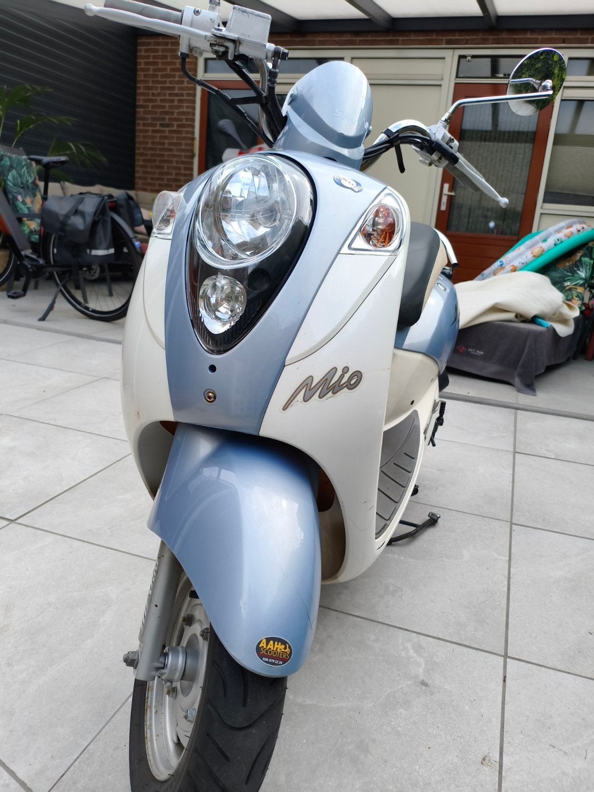 Sym Mio 50 2014, Fietsen en Brommers, Scooters | SYM, Ophalen, Zo goed als nieuw, Benzine, Mio