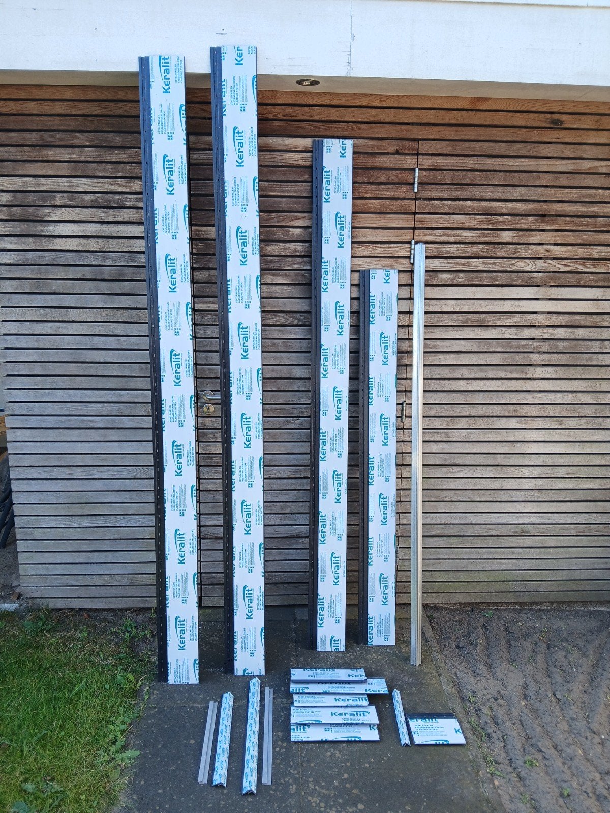 Keralit Sponningdeel Zwartgrijs Houtnerf RAL 7021, Ophalen, Nieuw, Overige materialen, 100 mm of meer