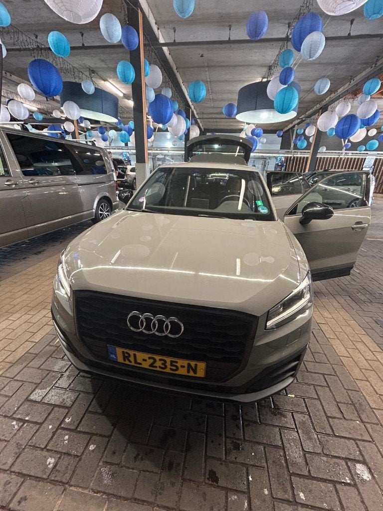 Audi Q2 1.4 Tfsi CoD 150pk S Tronic 2018 Grijs, Auto's, Euro 5, 4 cilinders, Leder en Stof, Origineel Nederlands