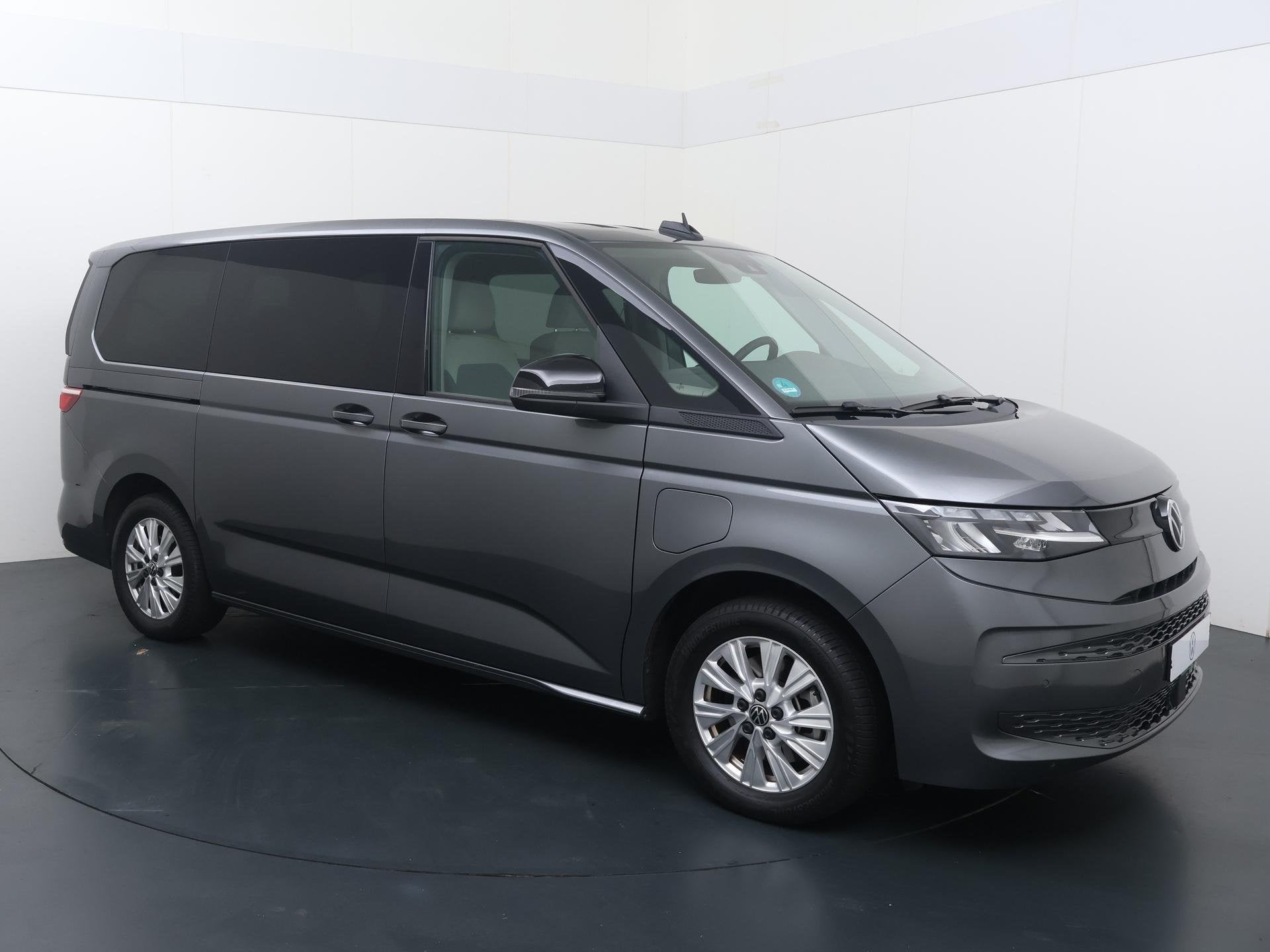 Volkswagen Bedrijfswagens Multivan 1.5 eHybrid L2 Economy Bu, Auto's, 12 maanden, Stof, Euro 6, 150 min