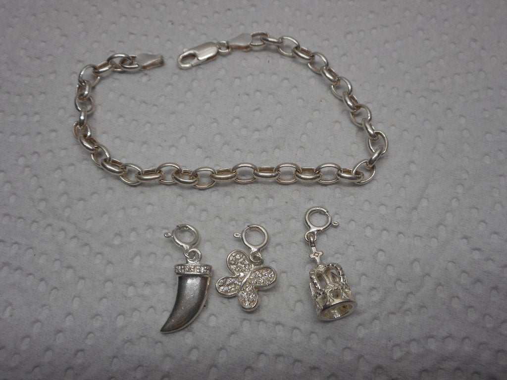 Zilveren schakel armband met 3 afneembare bedels nr.1134