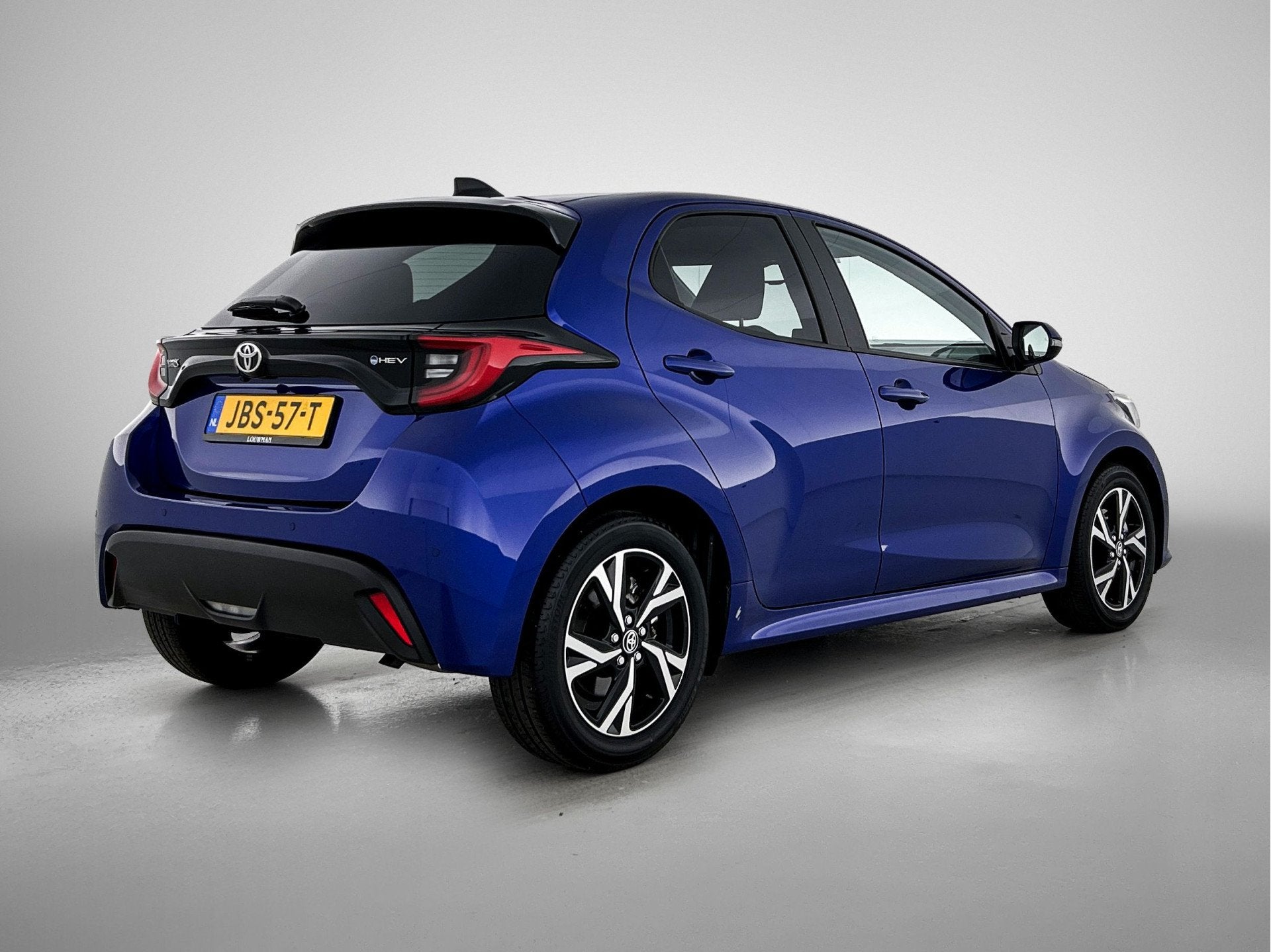 Toyota Yaris 1.5 Hybrid 115 Dynamic Comfort Pack | BTW voert, 12 maanden, Gebruikt, Blauw, Hybride Elektrisch/Benzine