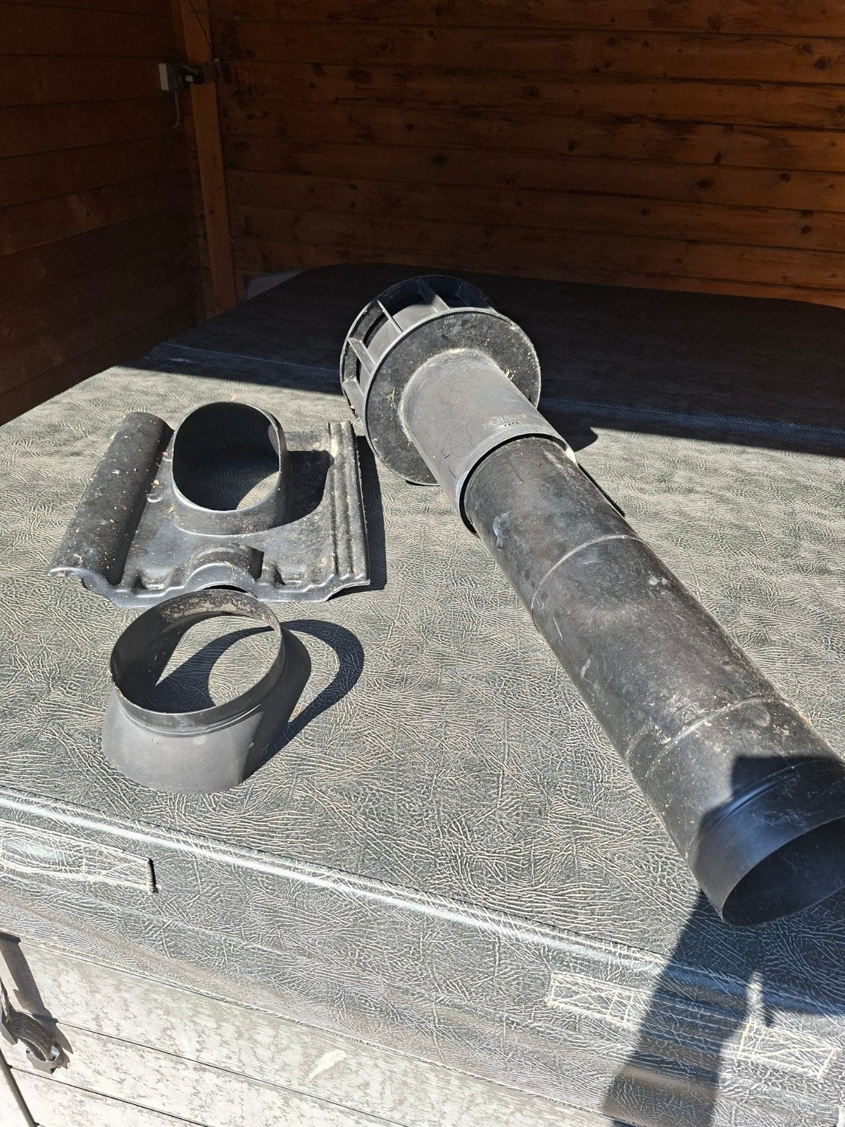 dakdoorvoer met dakpan, Ophalen, Afzuiger