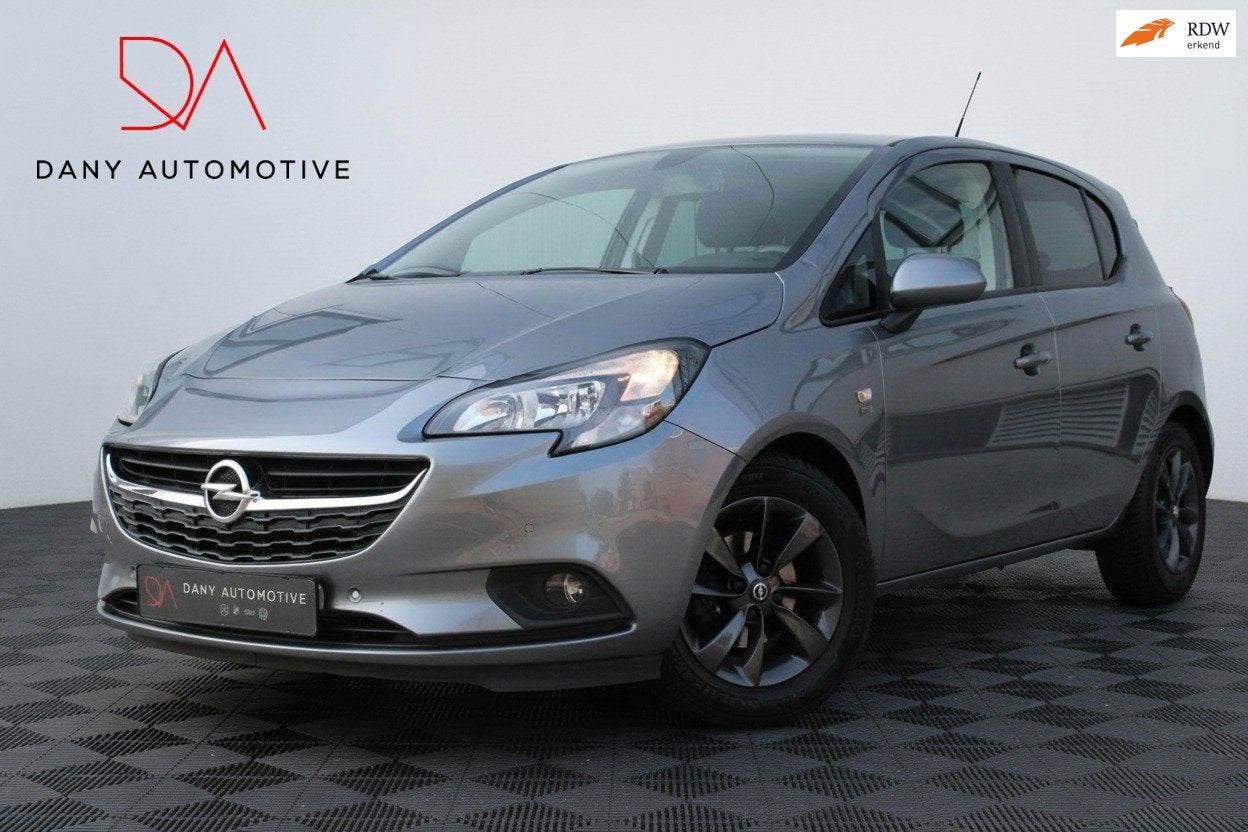 Opel Corsa 1.4 120 Jahre VOL AUTOMAAT I CARPLAY I CAMERA I S, Auto's, Stof, Gebruikt, 4 cilinders, Bedrijf