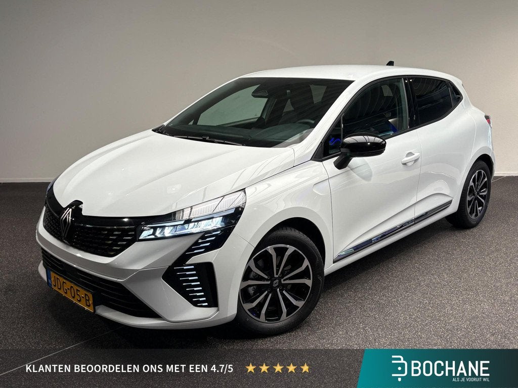 Renault Clio 1.6 E-Tech Full Hybrid 145 techno | Navigatie |, Auto's, Gebruikt, Met garantie (alle), Leder en Stof, Wit