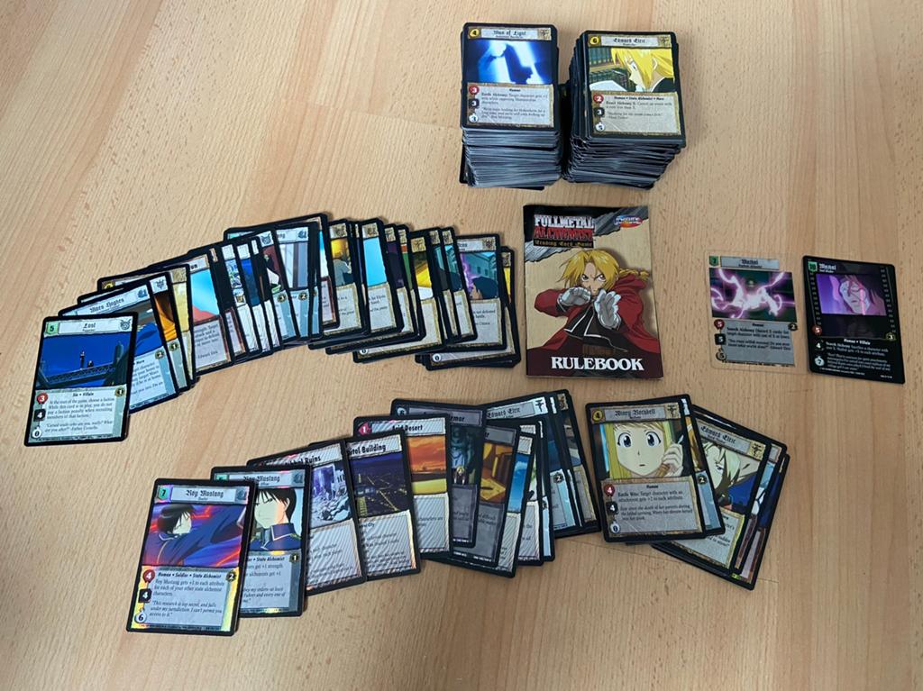 Mooi Lot Fullmetal Alchemist Trading Card Game kaarten!, Ophalen, Zo goed als nieuw, Meerdere kaarten, Foil