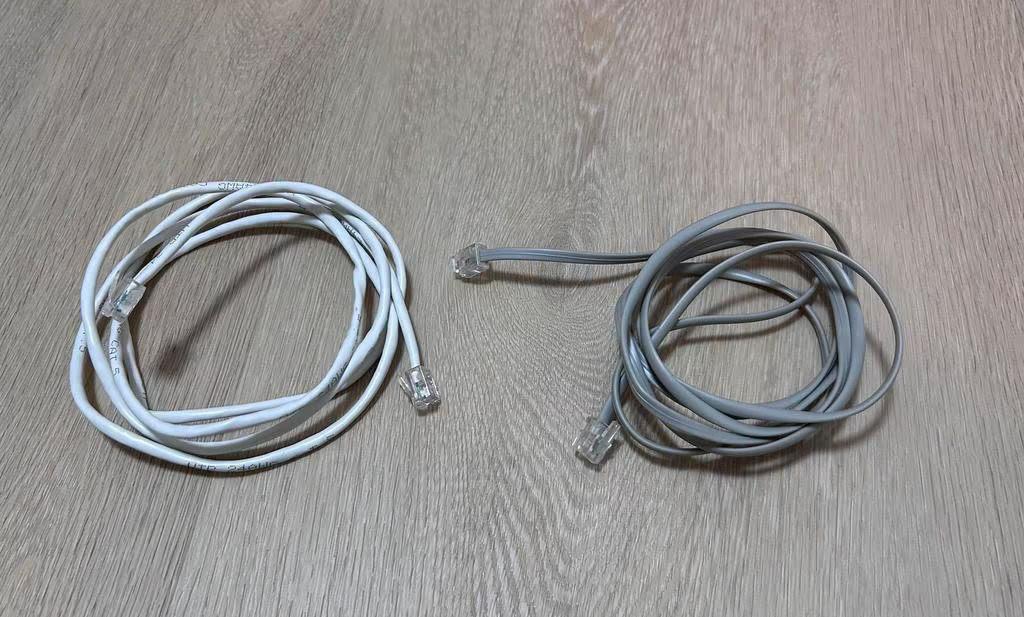 UTP Cat5 RJ11 kabels (2 stuks), Ophalen of Verzenden, Zo goed als nieuw
