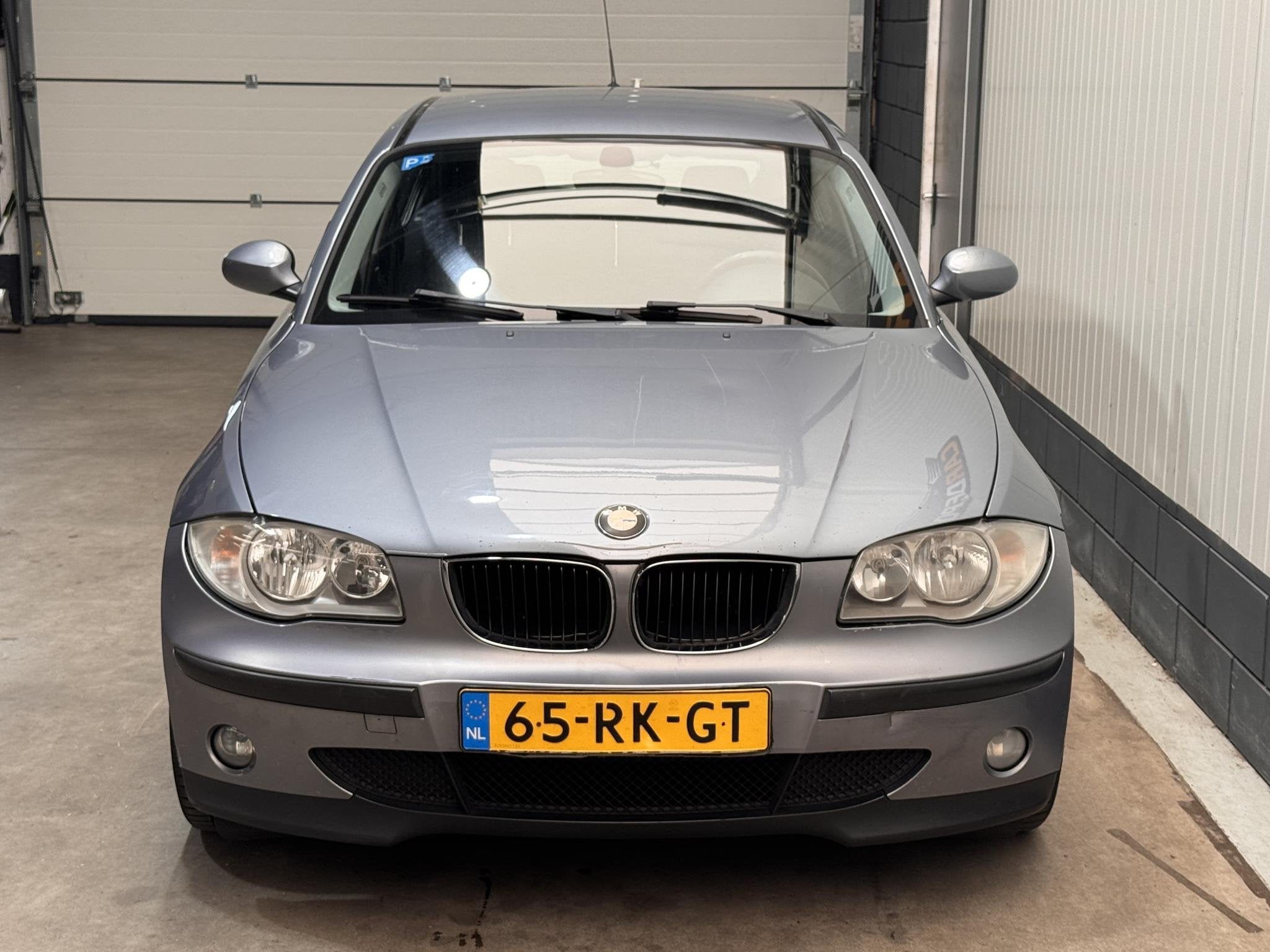 BMW 1-serie 116i, Gebruikt, Zwart, 4 cilinders, 116 pk