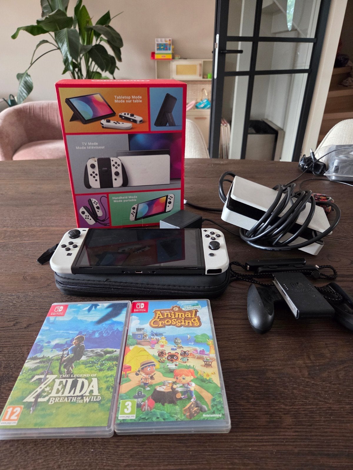 Nintendo Switch OLED met 2 games en accessoires, Ophalen of Verzenden