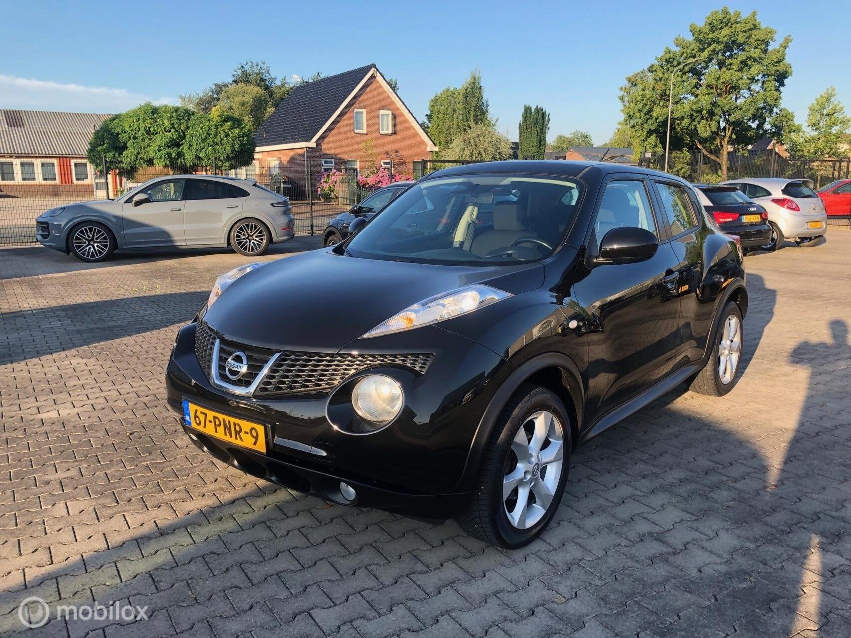 Nissan Juke 1.6 CRUISE ECC NAVI CAMERA LMV, Auto's, Nissan, Euro 5, Stof, Zwart, 4 cilinders