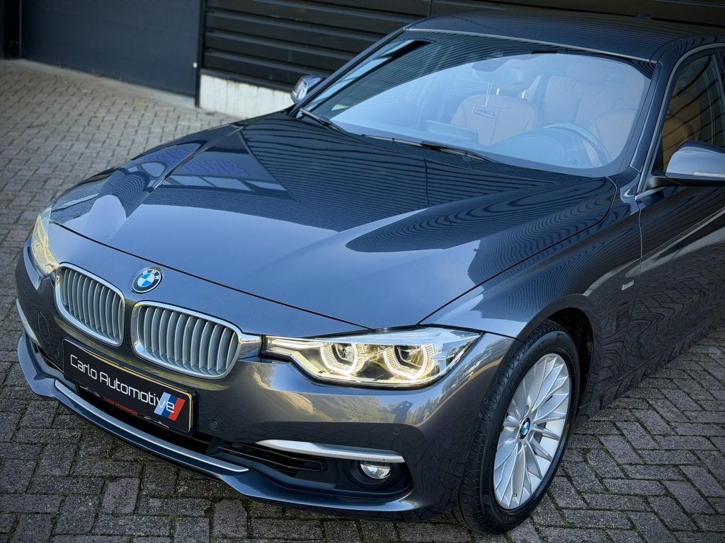 Bmw 3-serie 320i INDIVIDUAL VIRTUAL|H/K|360CAM|SPORTLEER, Euro 6, 4 cilinders, Verwarmde buitenspiegels, 184 pk
