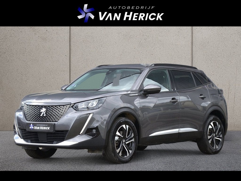 Peugeot 2008 1.2 PureTech Allure 130PK Automaat | Navigatie, Auto's, Peugeot, Gebruikt, Zwart, 1199 cc, Leder en Stof